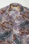 Wakame Shirt Abstract Leaves Print Purple featuring a floral grey pattern with intricate leaf designs, crafted with Italian overstock fabric by independent Berlin menswear brand A.D.Deertz.
