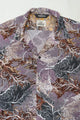 Wakame Shirt Abstract Leaves Print Purple featuring a floral grey pattern with intricate leaf designs, crafted with Italian overstock fabric by independent Berlin menswear brand A.D.Deertz.