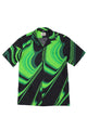Wakame Shirt Black Green featuring an avant-garde green and black swirling pattern, short sleeves, and a relaxed collar, crafted from Italian overstock fabric for lasting wear.