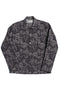 Black and navy Tapi Overshirt Denim Flower with blue floral pattern, button-up long sleeves, and classic collar, crafted from Italian luxury mill overstock fabric.