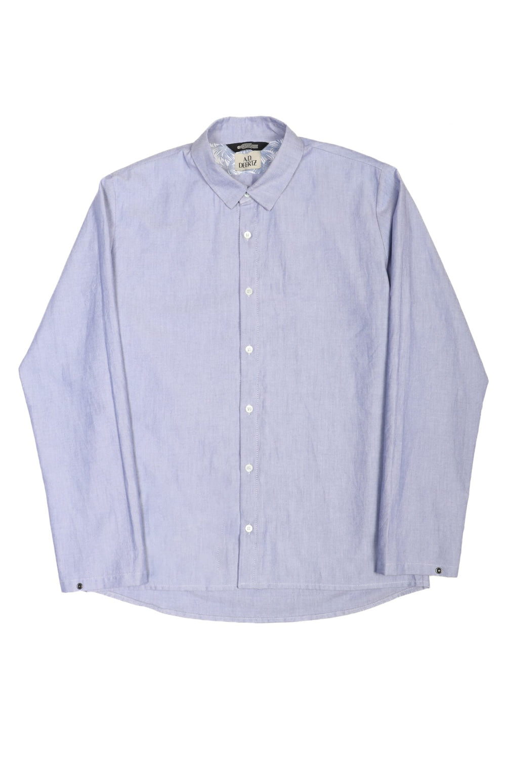 Reed Shirt Blue Oxford in a classic light blue tone, featuring a button-down collar and white buttons, ideal for timeless menswear styling from an independent Berlin label.