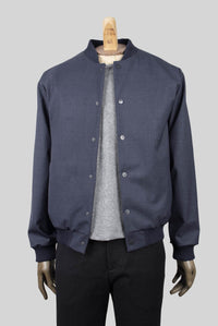 Jacket cut from a  navy waterproofed wool mix mesnwear berlin