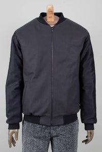 Varsity jacket in a dark grey wool with teflon moleskin sleeves menswear berlin addeertz