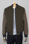 Varsity Jacket in an olive heavy wool with suede looking sleeves