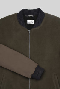 Varsity Jacket in an olive heavy wool with suede looking sleeves menswear berlin